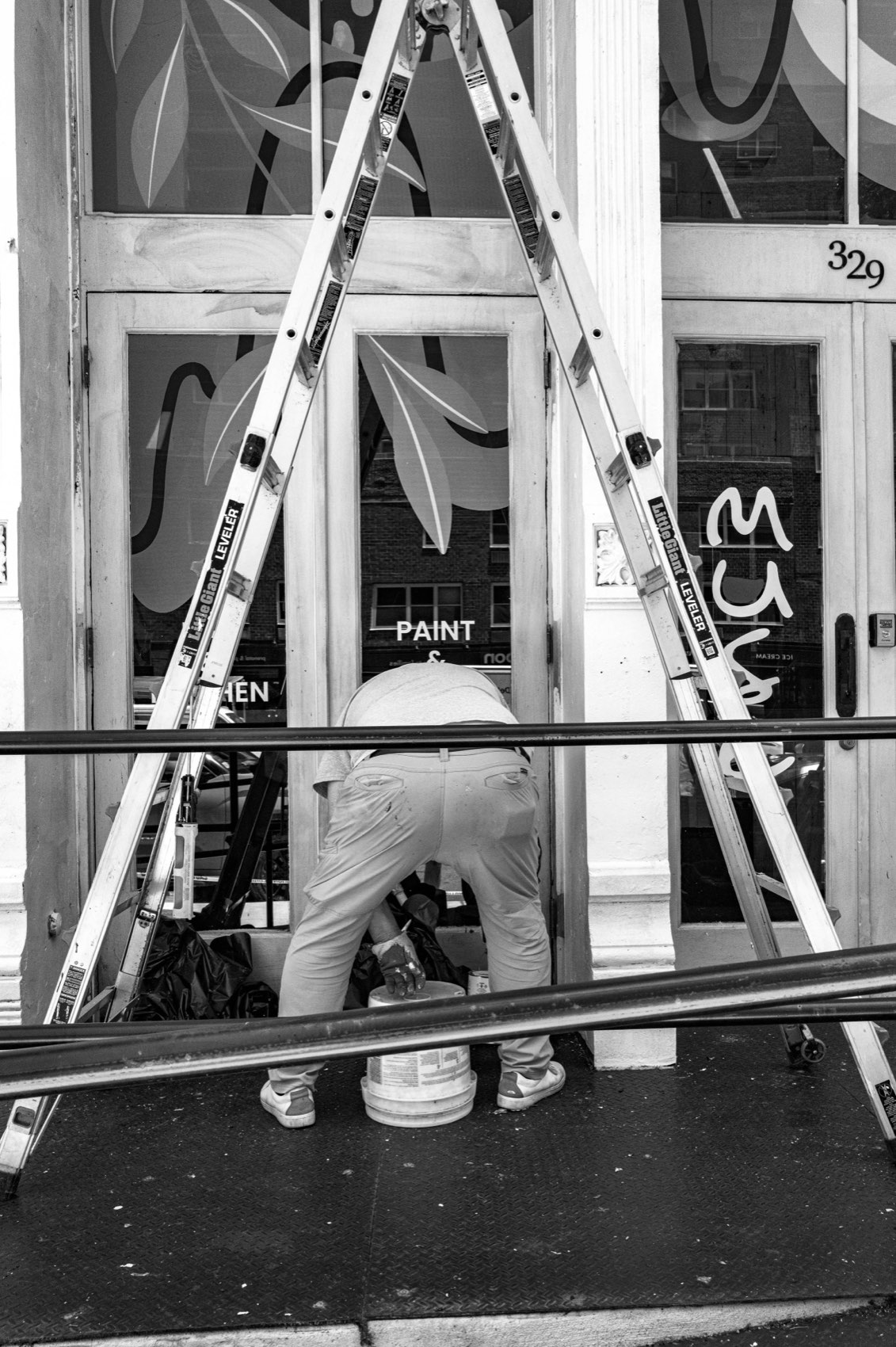 Two Ladders, One Wall. New York.