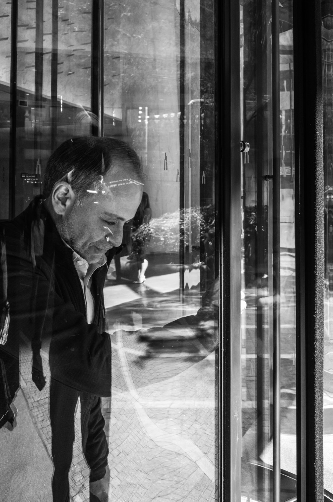 Leaning on the Glass. New York.