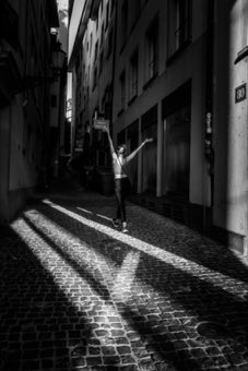 Arm Raised on the Cobbles. Switzerland.