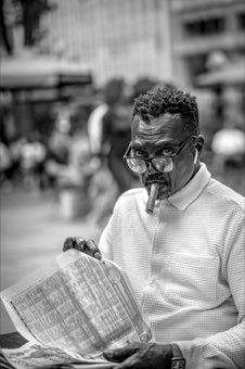 Cigar and Broadsheet. New York.