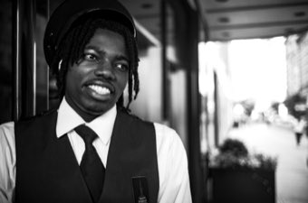 The Doorman's Grin. New York.