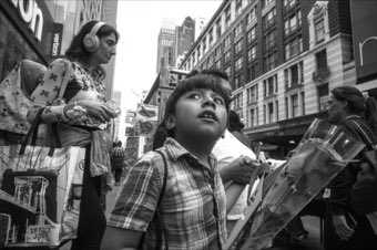 Looking Up in the Crowd. New York.