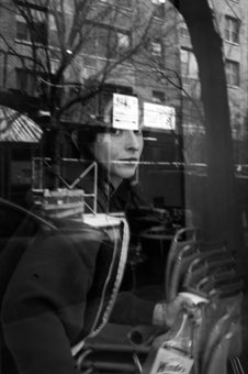 Behind the Cafe Glass. New York.